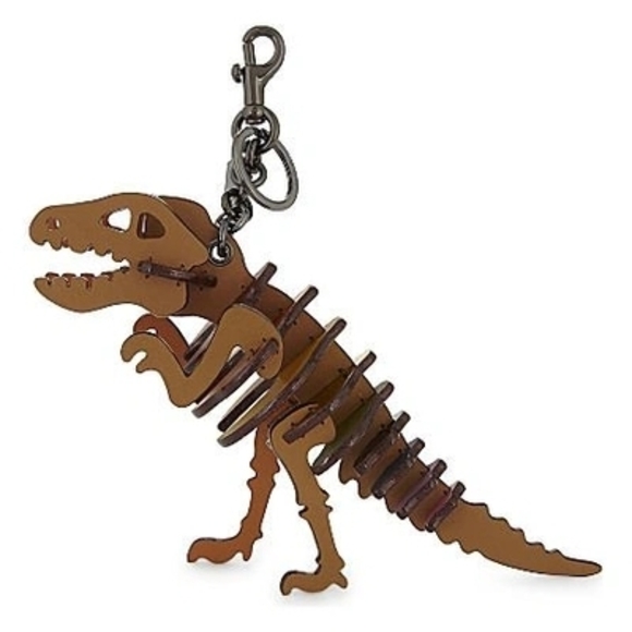 Coach Accessories - Coach Tan Dinosaur Keychain
